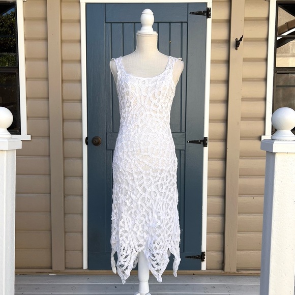White House Black Market Dresses & Skirts - White House Black Market Asymmetrical White Lace Dress
Women’s Size 6